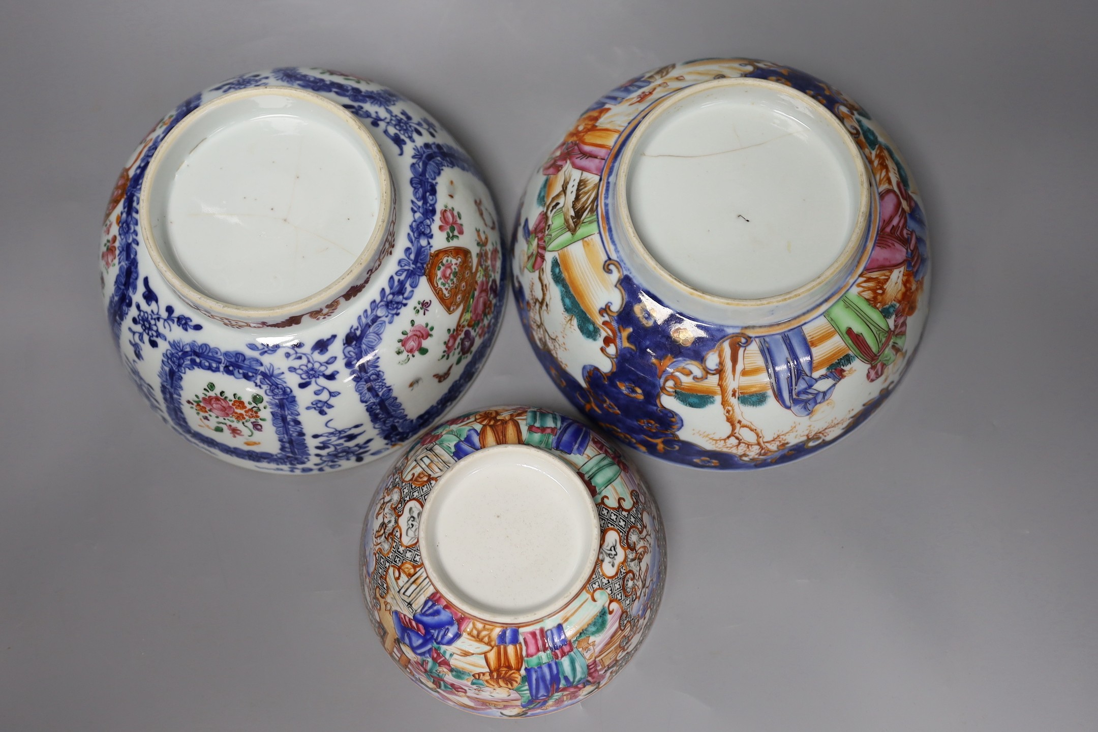 Three 18th century Chinese export famille rose bowls (two a/f), largest bowl 19.5 cms diameter